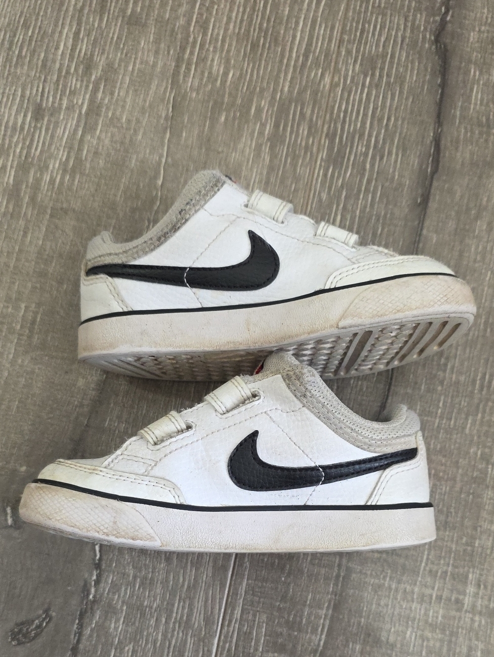 Nike White Kids Velcro Sneakers with Red Swoosh Accent